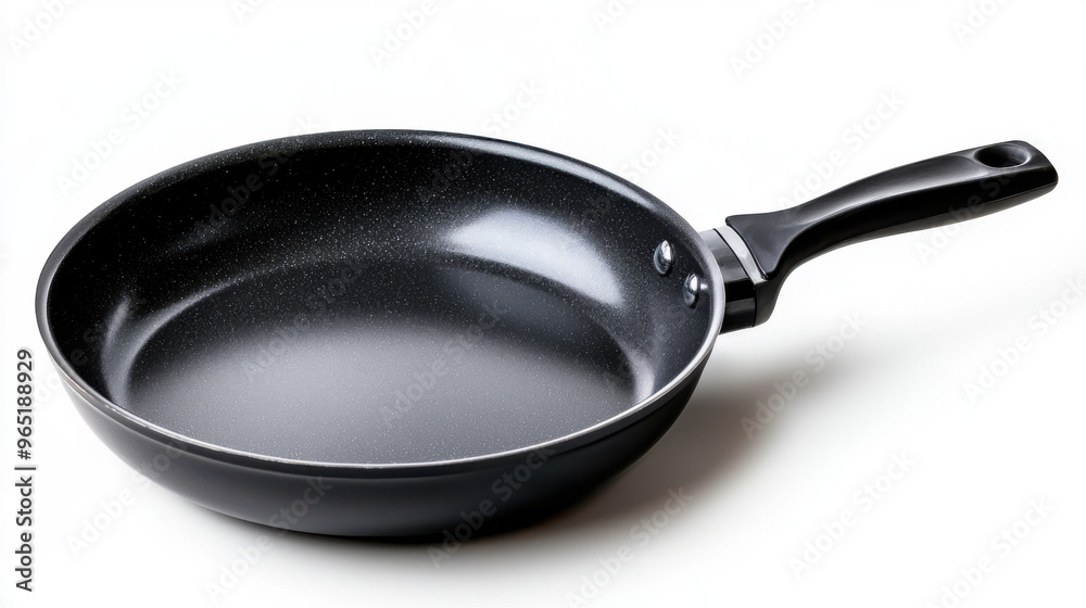 A simple black frying pan with black handle A simple black frying pan with black handle