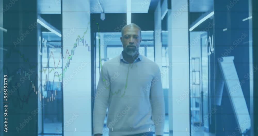 Animation of financial data processing over african american businessman walking in office Animation of financial data processing over african american businessman walking in office