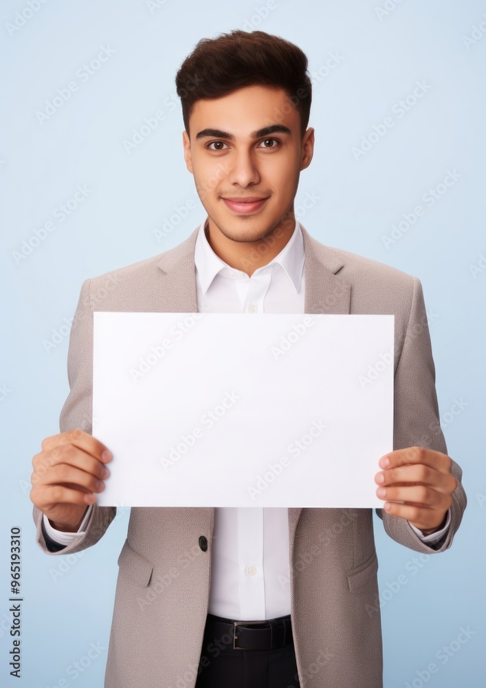 A enginerr latin man portrait holding adult.