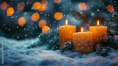 Christmas background with candles on a snow and bokeh photo