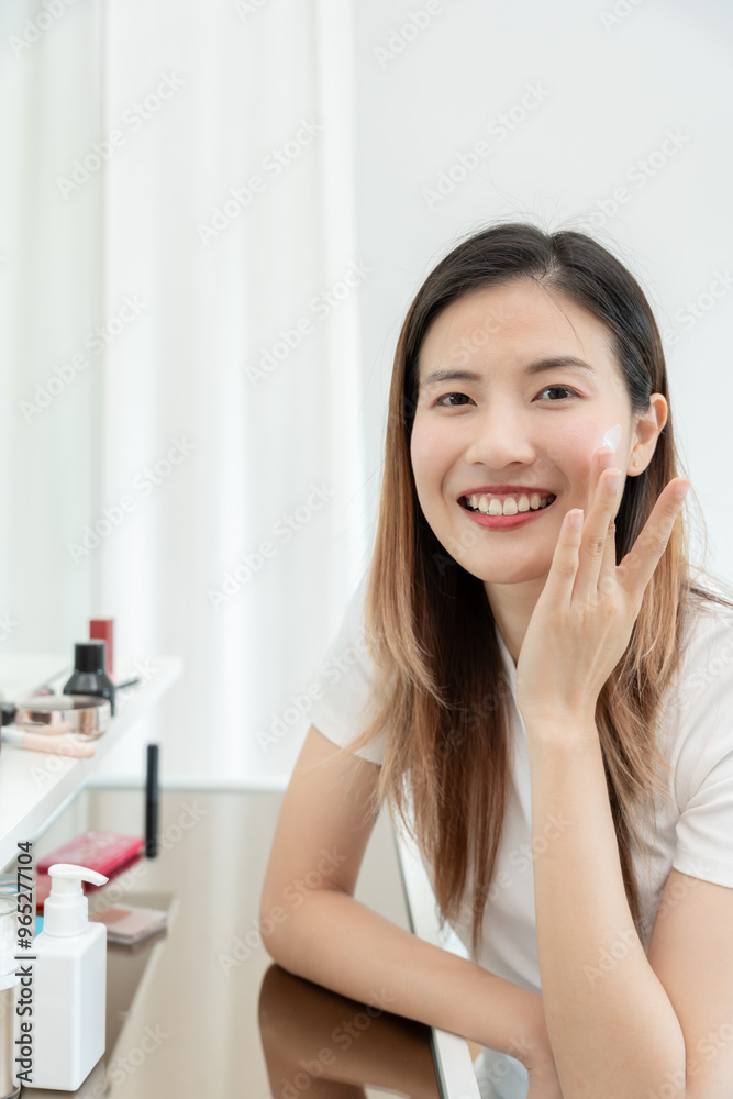 Beautiful Asian woman smile use cream for good skin. face of a healthy woman apply cream and makeup. Advertisement for skin cream, anti-wrinkle, baby face, whitening, moisturizer, tighten pores serum Beautiful Asian woman smile use cream for good skin. face of a healthy woman apply cream and makeup. Advertisement for skin cream, anti-wrinkle, baby face, whitening, moisturizer, tighten pores serum