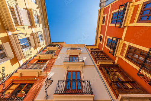 Low angle view of some old residential buildings in the old town of Valencia city, Spain