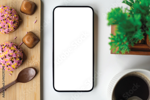 phone with isolated screen background white table sweets in cafe