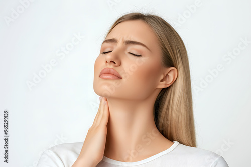 American beautiful woman with neck pain. Concept of sore throat, pharyngitis, laryngitis, choking photo