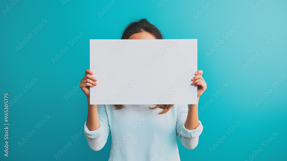 Person Holding a Blank Sign with a Vibrant Background Person Holding a Blank Sign with a Vibrant Background