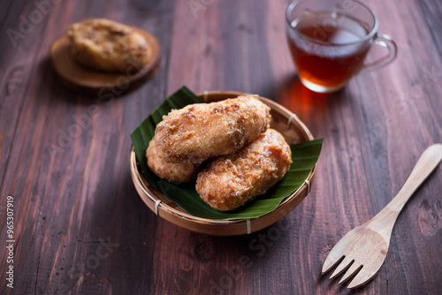 Kue Gemblong, Getas, Kemplang, Indonesian Traditional Snack made from Sticky Rice Coated with Sugar. Perfect for recipe, article, catalogue, commercial, or any cooking content. photo