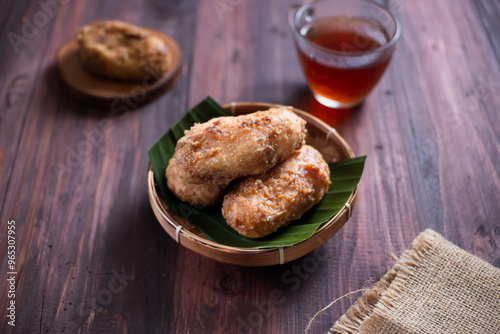 Kue Gemblong, Getas, Kemplang, Indonesian Traditional Snack made from Sticky Rice Coated with Sugar. Perfect for recipe, article, catalogue, commercial, or any cooking content. photo