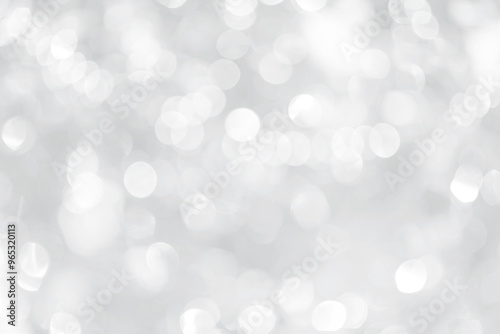 Abstract blurred shiny silver bokeh background, holiday and festive season concept background