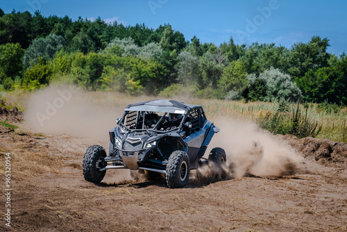 UTV buggy, rally or 4x4 in the action on sand