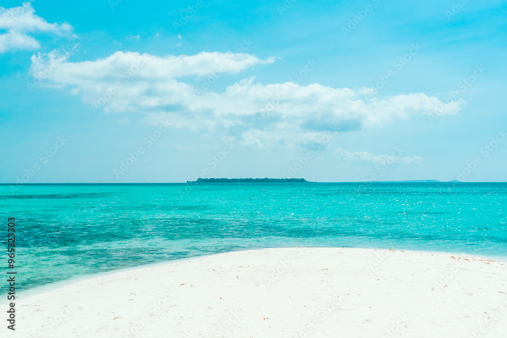 Nature landscape view of beautiful tropical beach and sea in sunny day. summer background and summer holiday concept. Nature landscape view of beautiful tropical beach and sea in sunny day. summer background and summer holiday concept.