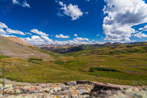 Rolling tundra hills with distant mountains