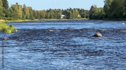 Kiiminkijoki river landscape in Haukipudas, Oulu Finland photo