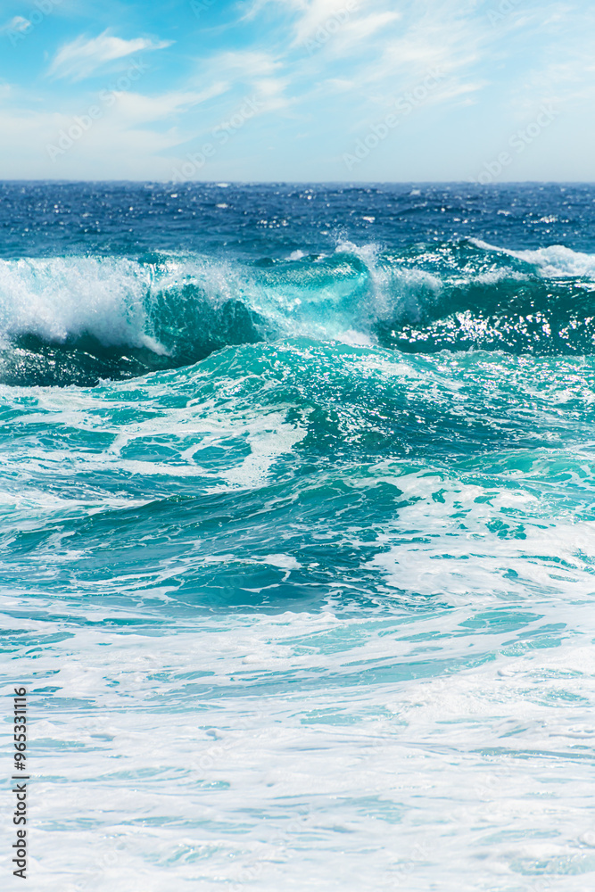 Waves on the beach in windy day. Santorini island, Greece.