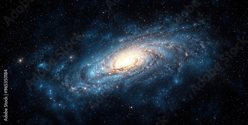 Spiral galaxy is sparkling with bright blue stars and glowing with a warm light center. High quality photo