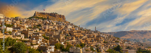 Ancient and stone houses of Old Mardin (Eski Mardin) with Mardin Castle, Located South Eastern of Turkey photo