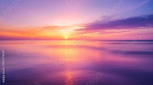 Sunset over calm ocean with vibrant colors and reflections, serene nature concept