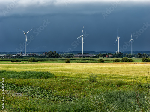 Wind turbines stand tall in Huissen, Netherlands