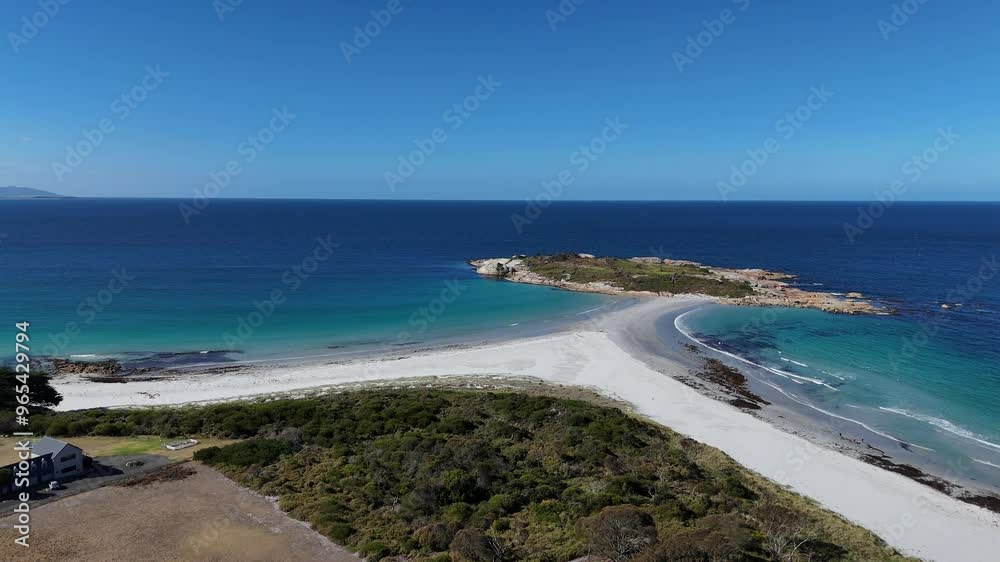 Aerial panoramic view of Diamond Island Bicheno and the azure waters in Tasmania, Australia. Aerial panoramic view of Diamond Island Bicheno and the azure waters in Tasmania, Australia.