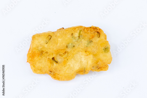 Bakwan is an Indonesian-style vegetable fritter made from a mixture of flour and assorted vegetables like carrots, cabbage, and bean sprouts.
