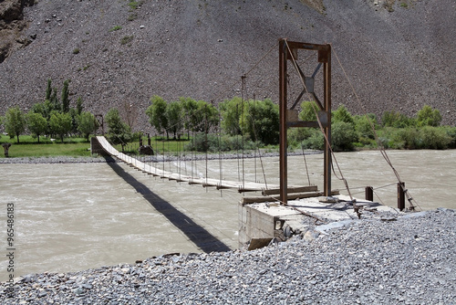 Tibetan bridge along the Bartang River in the Gorno-Badakhshan region in Tajikistan photo