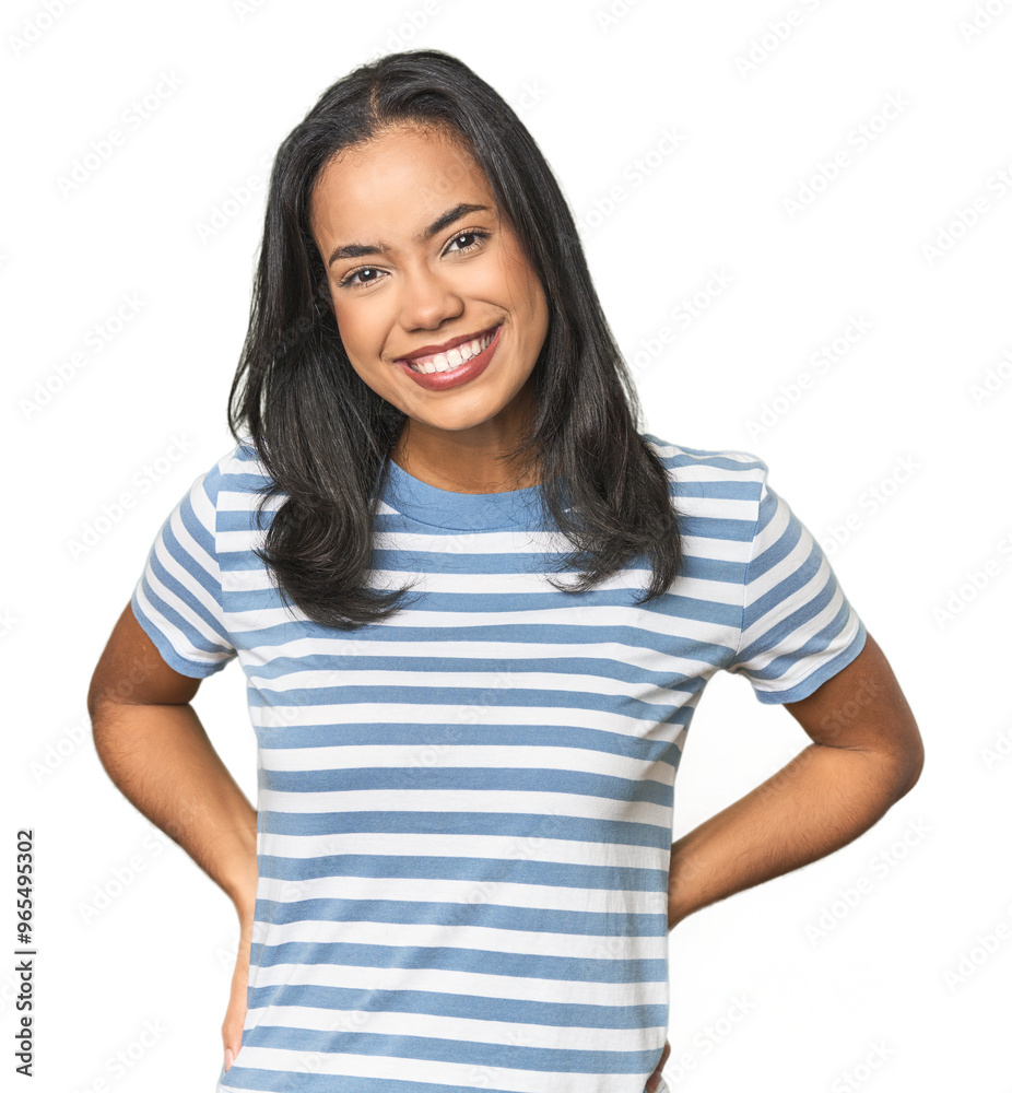 Young Latina posing in studio happy, smiling and cheerful. Young Latina posing in studio happy, smiling and cheerful.