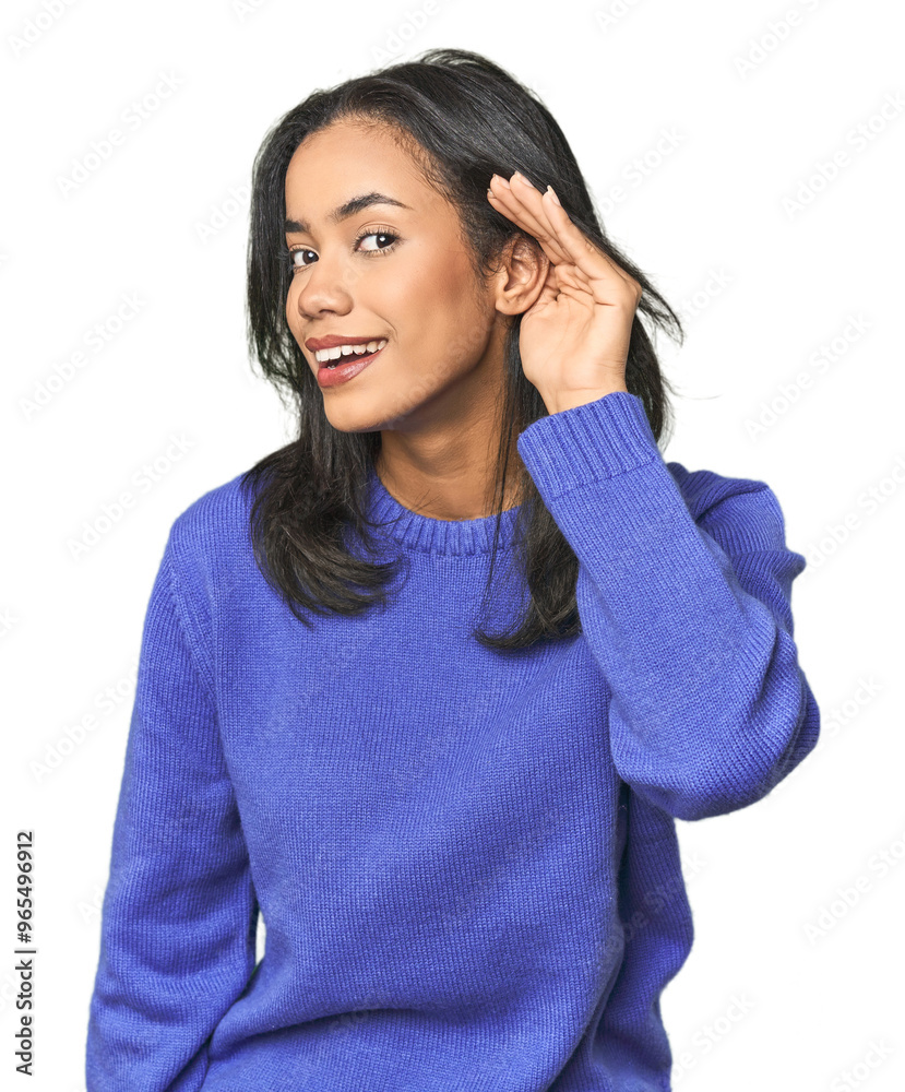 Simple portrait of a young Latina trying to listening a gossip. Simple portrait of a young Latina trying to listening a gossip.