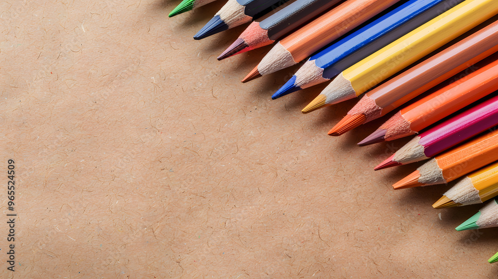 A closeup of colorful pencils arranged neatly on a brown background, ideal for creative, educational, and inspiring concepts such as design, illustration, and sketching A closeup of colorful pencils arranged neatly on a brown background, ideal for creative, educational, and inspiring concepts such as design, illustration, and sketching