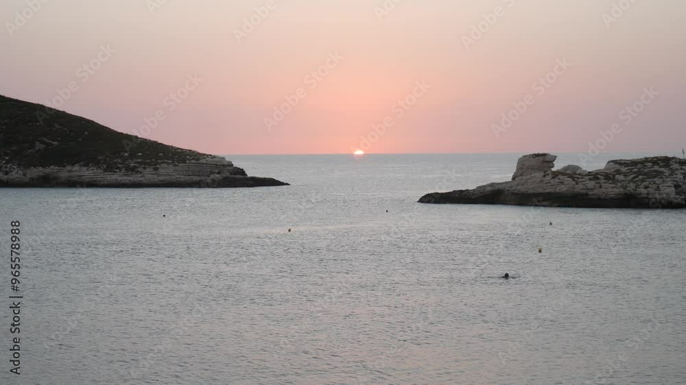 Beautiful sunrise over the Adriatic Sea and Campi island. Baia and Cala Campi, Vieste, Gargano National Park. Italy Beautiful sunrise over the Adriatic Sea and Campi island. Baia and Cala Campi, Vieste, Gargano National Park. Italy
