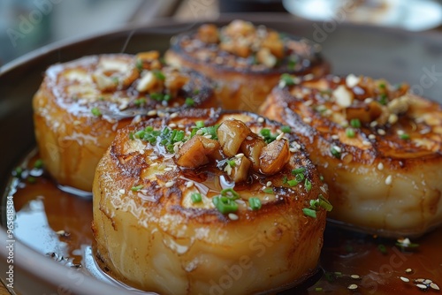 South Korea: Hotteok Pancake filled with brown sugar, honey, and nuts, served hot with the filling oozing out