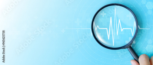 World heart day. focus heartbeat on blue background for checking the function of the patient heart. health insurance, love, international cardiology day, check up, heart attack and cardiology.
