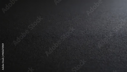 Abstract dark grey textured background.