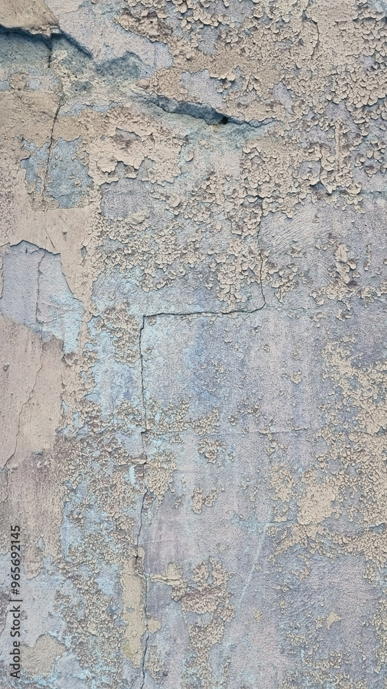 Fototapeta premium Peeling paint on an old wall. Grunge background for design.Selective focus