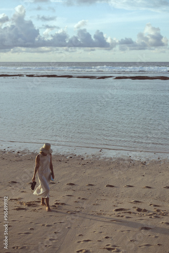 woman walking on beach