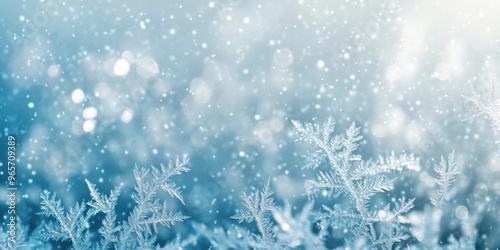 A serene winter scene featuring soft snowflakes falling gently amid a tranquil blue background, evoking peace and joy.