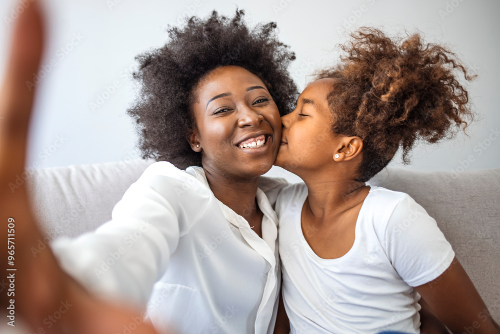 Joyful Mother And Daughter Sharing A Loving Moment At Home Joyful Mother And Daughter Sharing A Loving Moment At Home