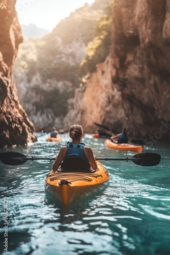 A kayaker exploring rocky valley in shallow sea