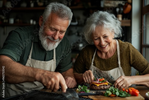 A cheerful elderly couple, wearing aprons, prepare and cook homemade burgers together in a cozy kitchen setting, showcasing their bonding and culinary skills.