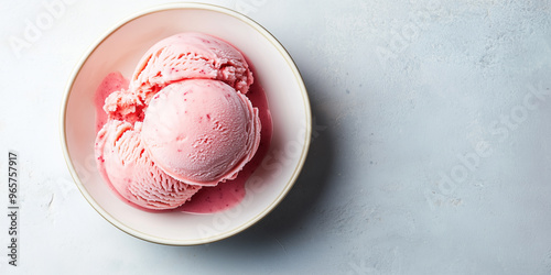 Single scoop of ice cream on a white plate, placed centrally under soft lighting photo