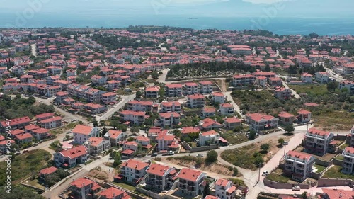 Datcha city from above. Aerial view of Turkish city with cosy similar houses photo