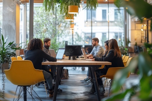 People working in co-working space or work in the office with laptop computer. photo