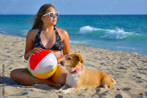 Toddler girl relaxing at beach