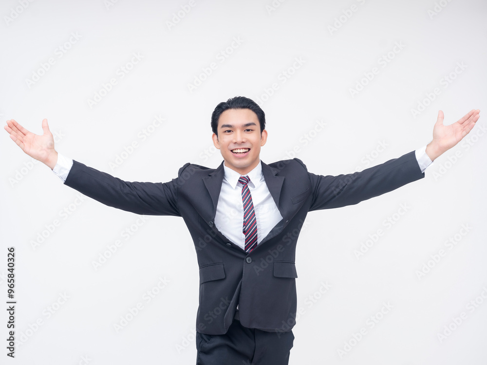 A young optimistic asian business executive with welcoming arms wide open. Isolated on a white background. A young optimistic asian business executive with welcoming arms wide open. Isolated on a white background.
