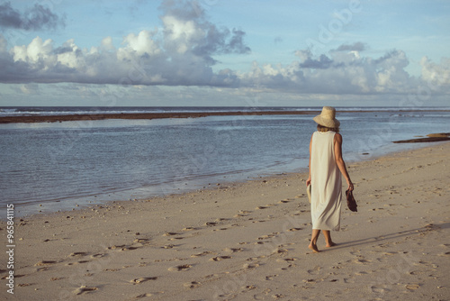 women walking on the beach 