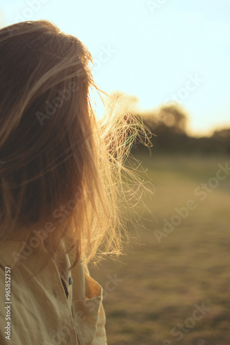 woman looking at sunset