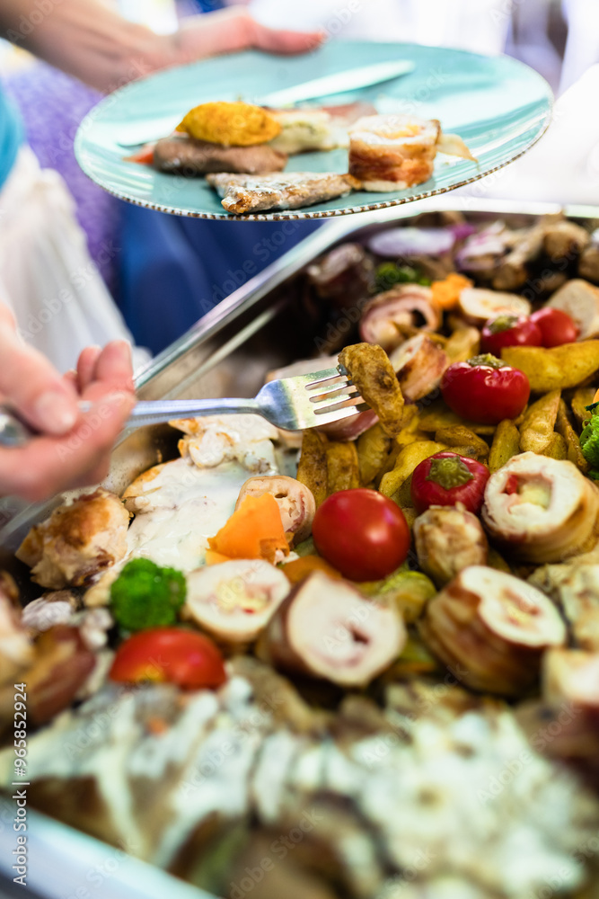Delicious buffet spread featuring assorted grilled meats, vegetables, and garnishes at a summer gathering in a vibrant outdoor setting Delicious buffet spread featuring assorted grilled meats, vegetables, and garnishes at a summer gathering in a vibrant outdoor setting