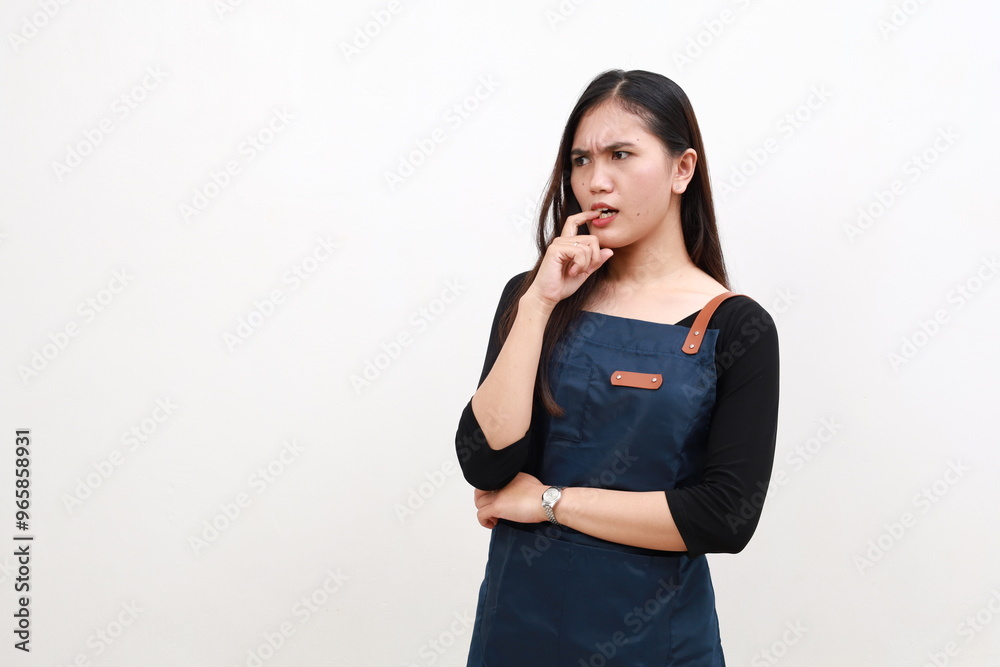 Young pretty woman wearing apron over isolated white background looking stressed and nervous with hands on mouth biting nails. Anxiety problem. Young pretty woman wearing apron over isolated white background looking stressed and nervous with hands on mouth biting nails. Anxiety problem.