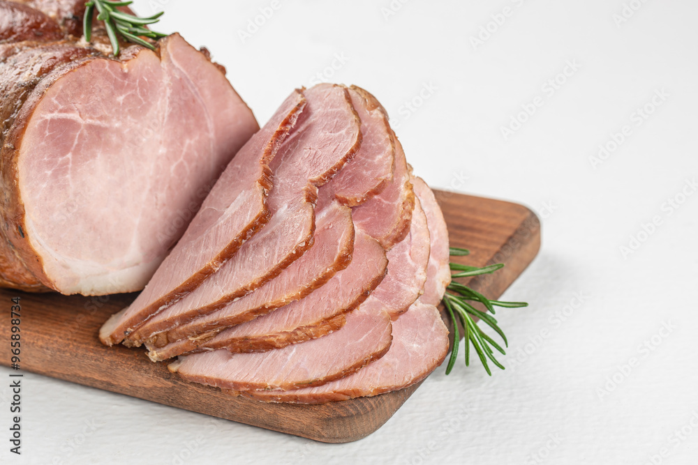 pork ham slices on a white background. Cold smoked meat with slices on a wooden board, top view. copy space pork ham slices on a white background. Cold smoked meat with slices on a wooden board, top view. copy space