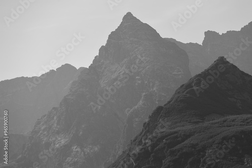 two rugged, high mountain peaks in the Tatra Mountains in Poland, black and white photo