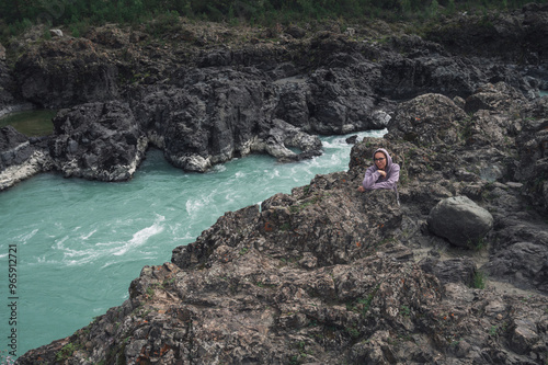 Woman at the river Katun at...