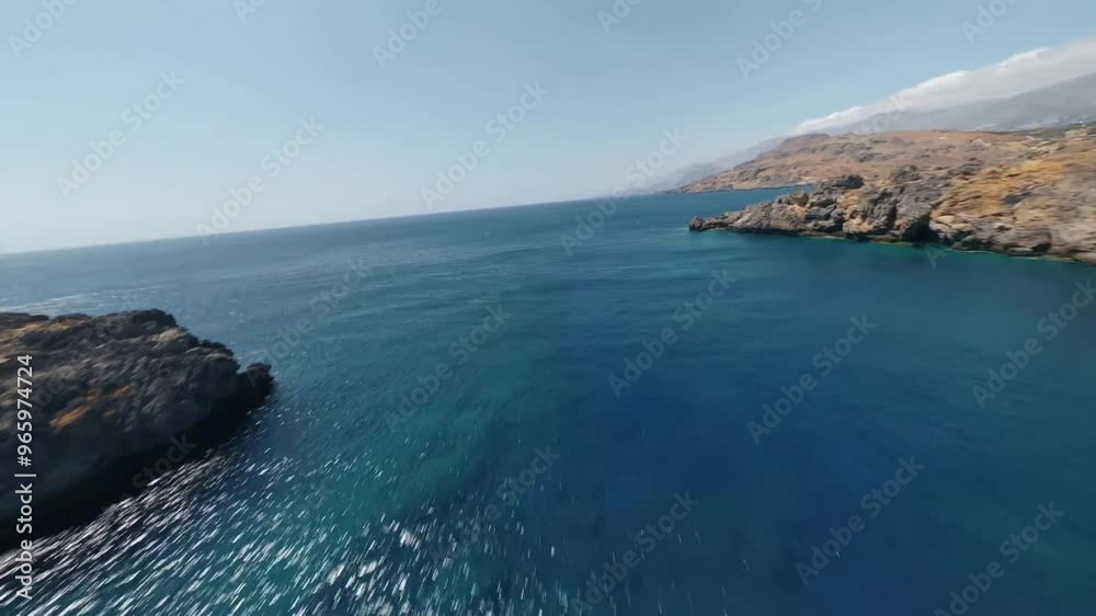 Beautiful landscape with a FPV drone on the sea, coastline, beach on the Greek island of Crete. Beautiful landscape with a FPV drone on the sea, coastline, beach on the Greek island of Crete.